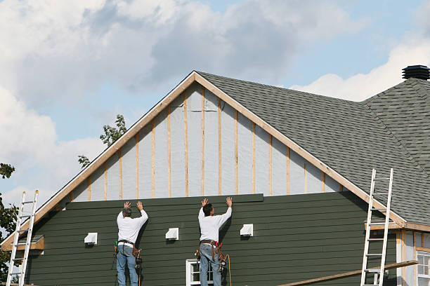 Professional Siding technician working in Chesterfield, VA